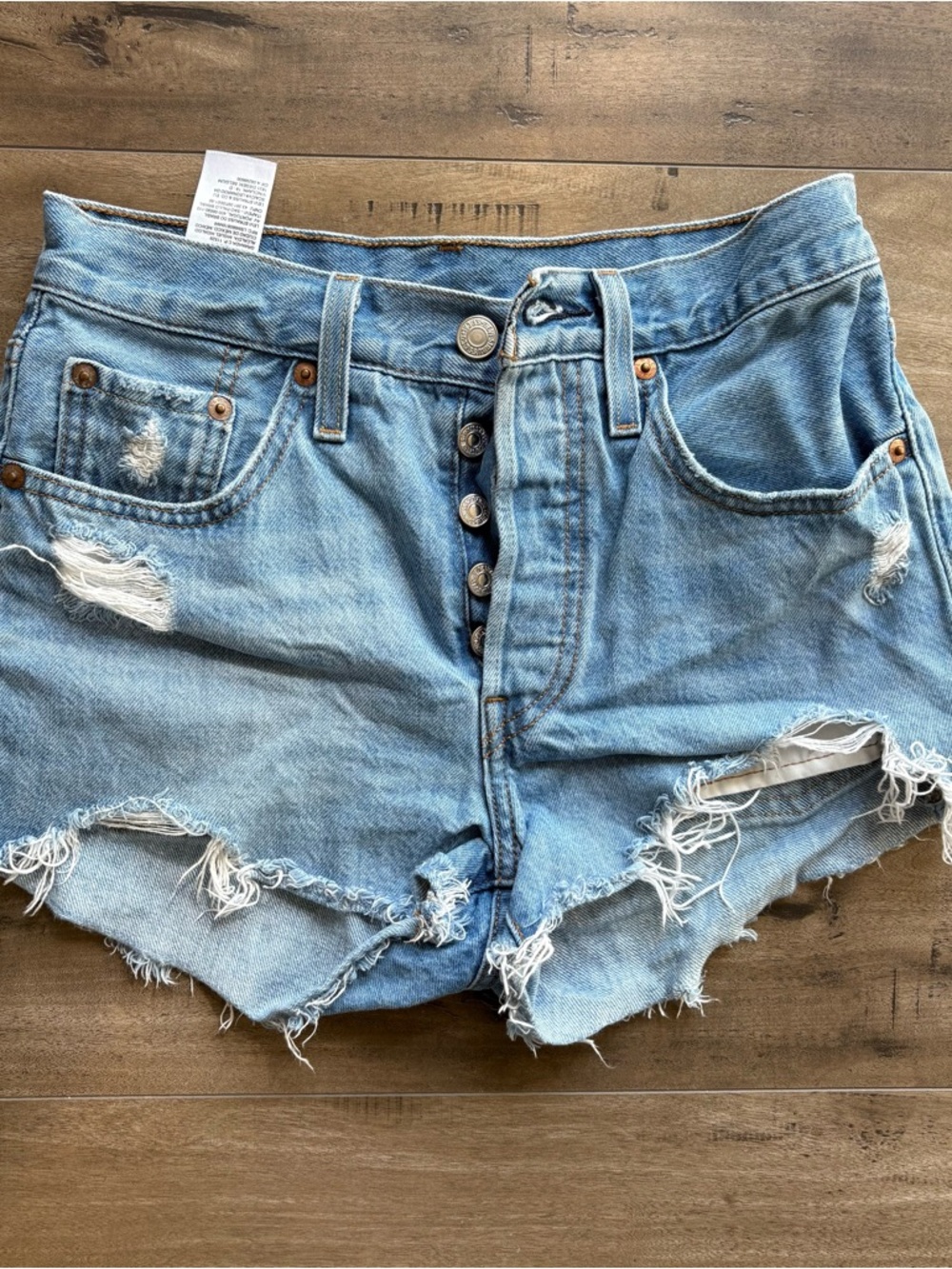Women’s Levi 501 Button Fly Light Wash Distressed Denim Shorts - Blue W24
